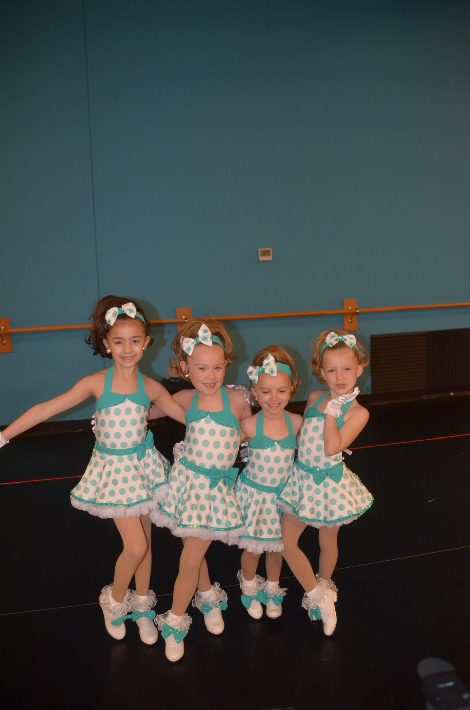 Young dancers in matching costumes